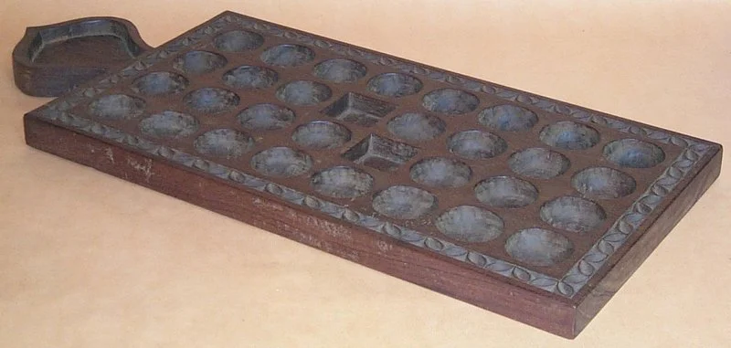 Photo for article 5 — Bao_board_from_zanzibar.DKFm03rZ.webp